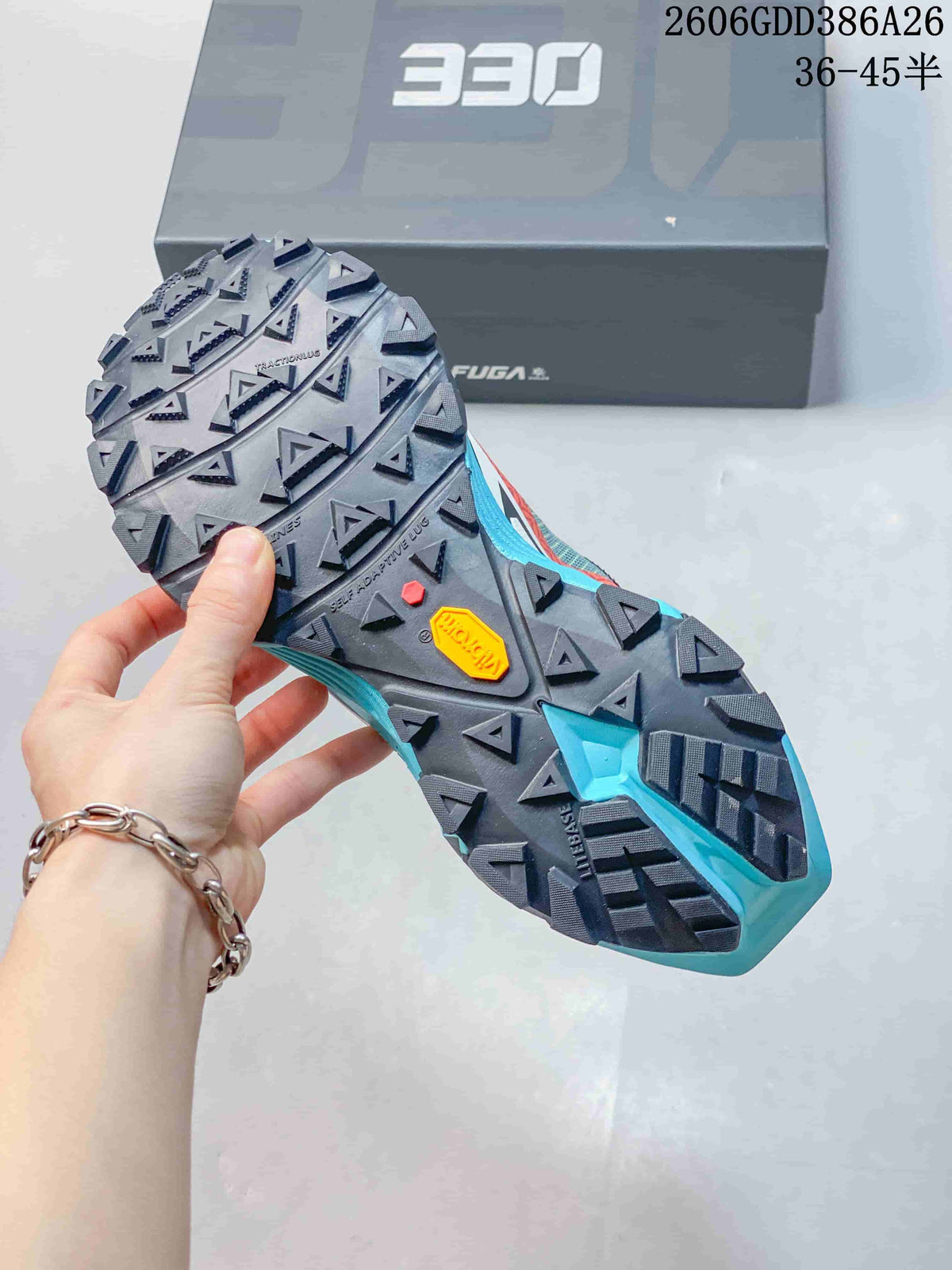 Close-up of the lugged outsole on a Kailas FUGA EX330 trail shoe
