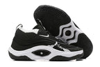 Black and white Nike Anthony Edwards 3 shoes, with outsole view