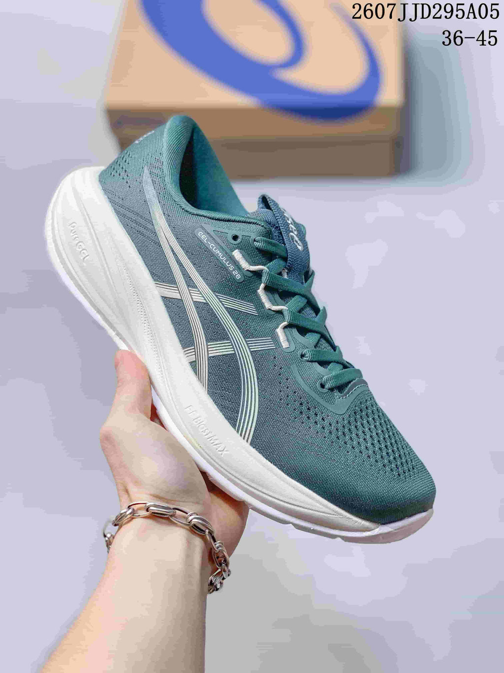 Teal-gray ASICS running shoe with pale side stripes and a white midsole.