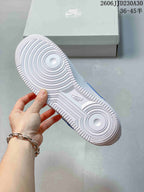 White outsole with circular tread patterns