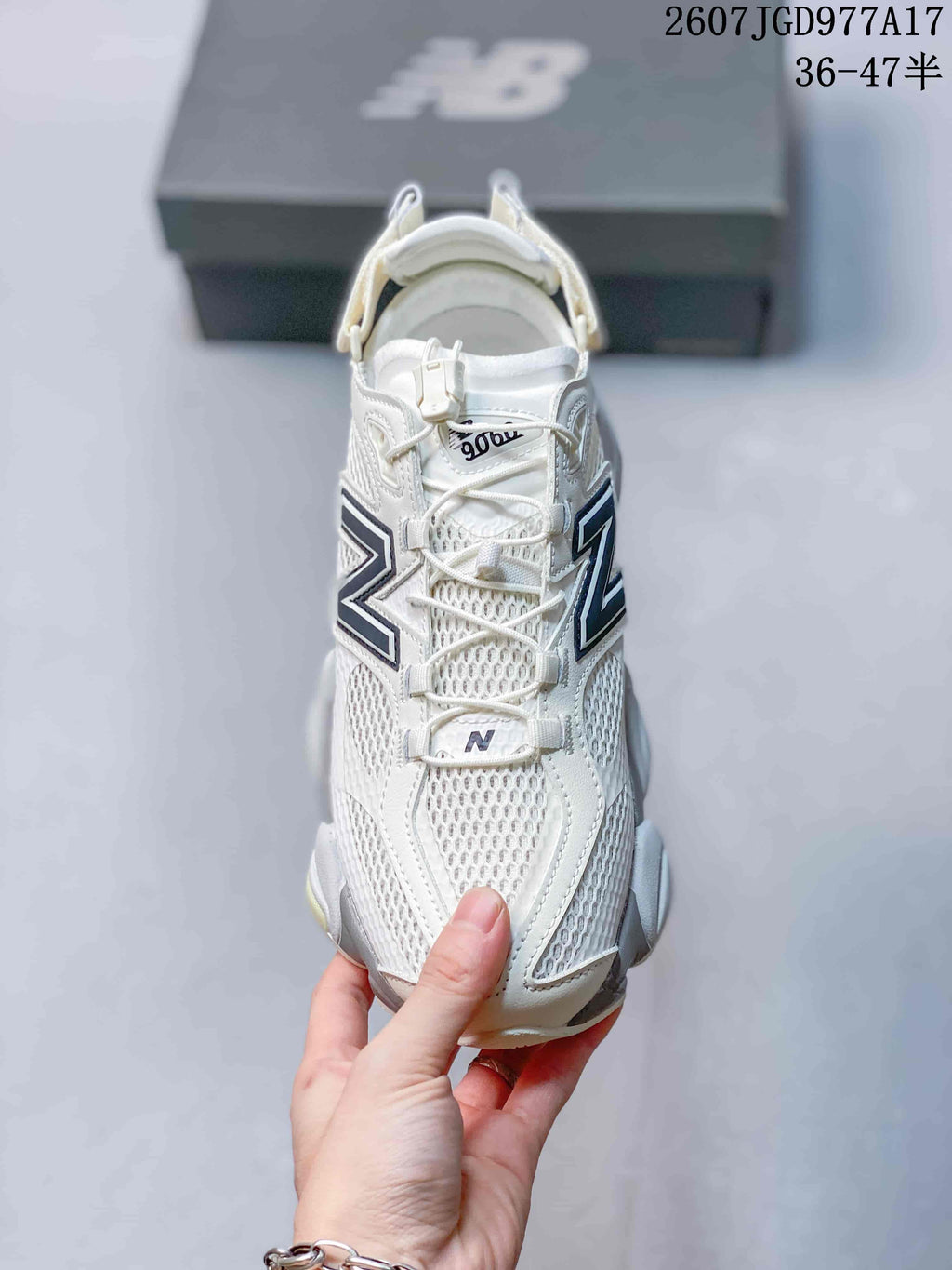 Top view showing the mesh toe box, laces, tongue branding, and side panels.