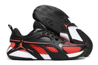 Side and outsole views of black and red Jordan Heir shoes