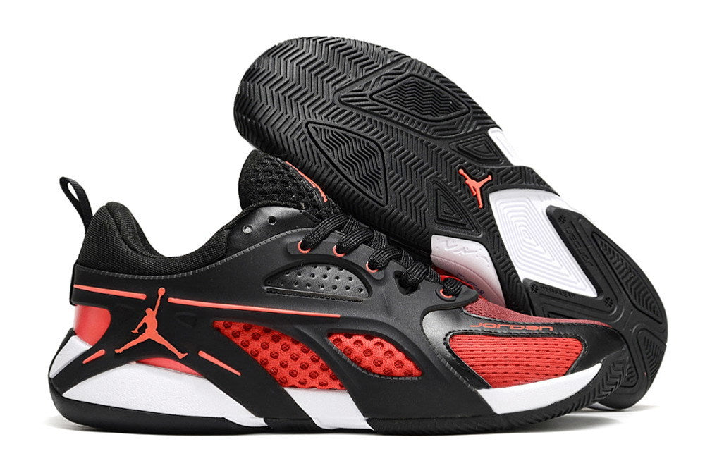 Side and outsole views of black and red Jordan Heir shoes