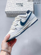 Side view of an off-white low-top sneaker with a dark Swoosh