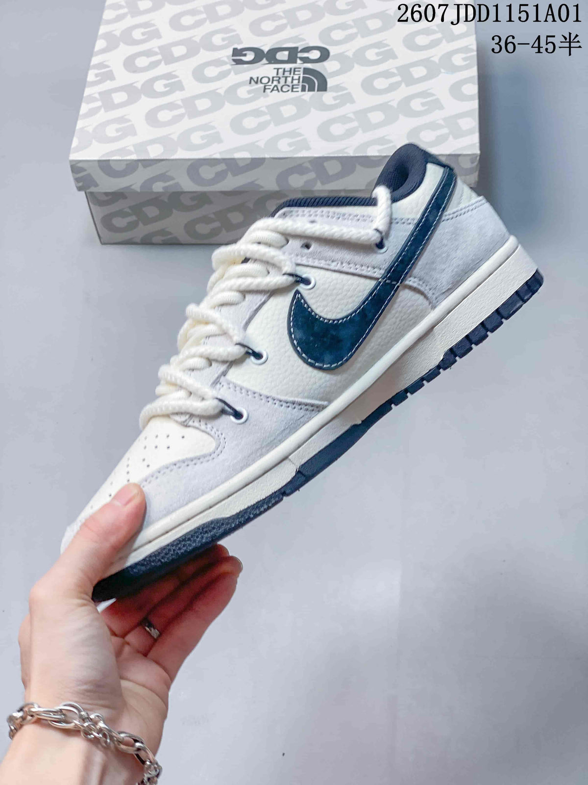 Side view of an off-white low-top sneaker with a dark Swoosh