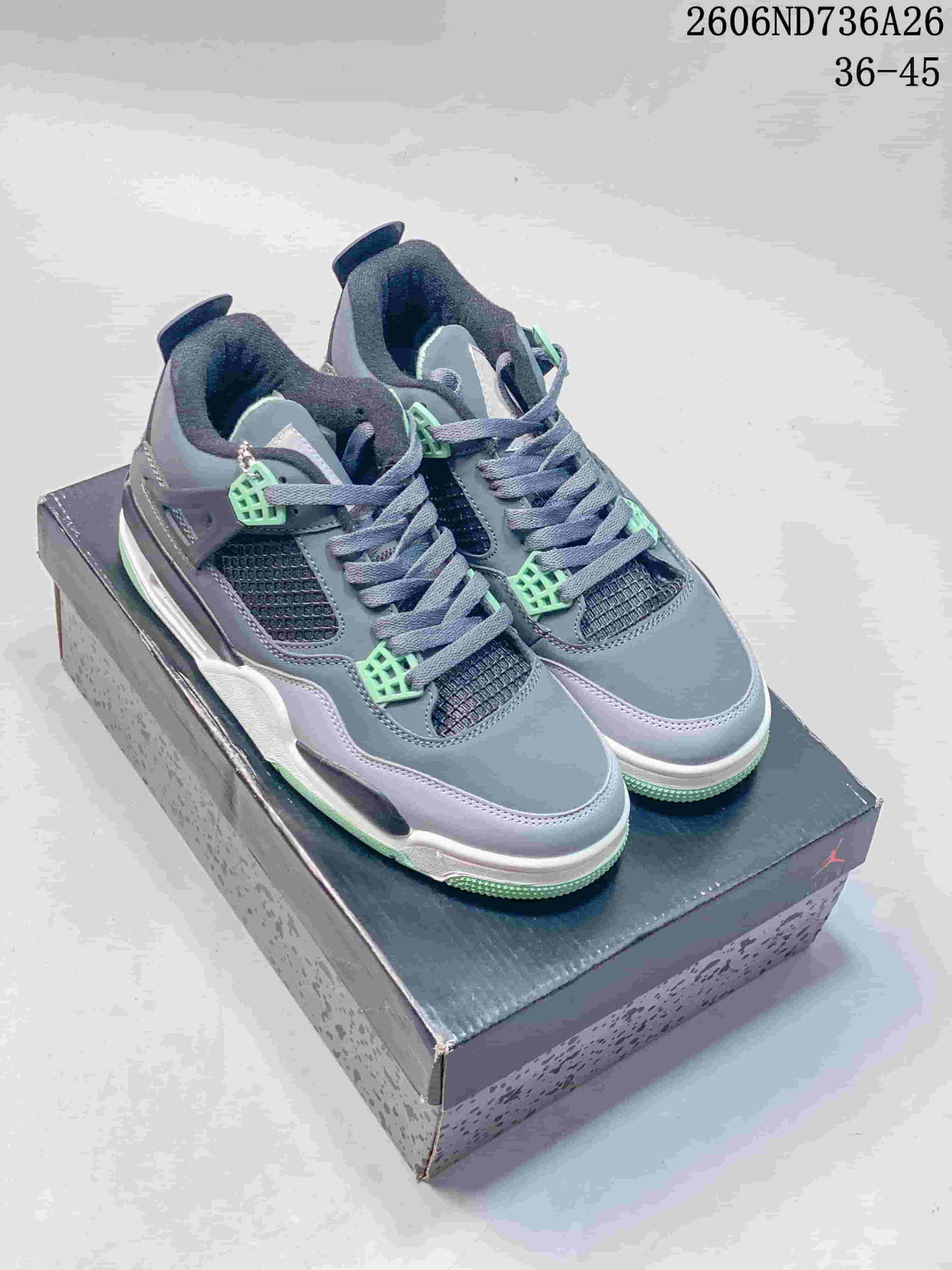 Pair of grey and mint Jordan Air Jordan 4 high-top sneakers displayed on a shoebox.