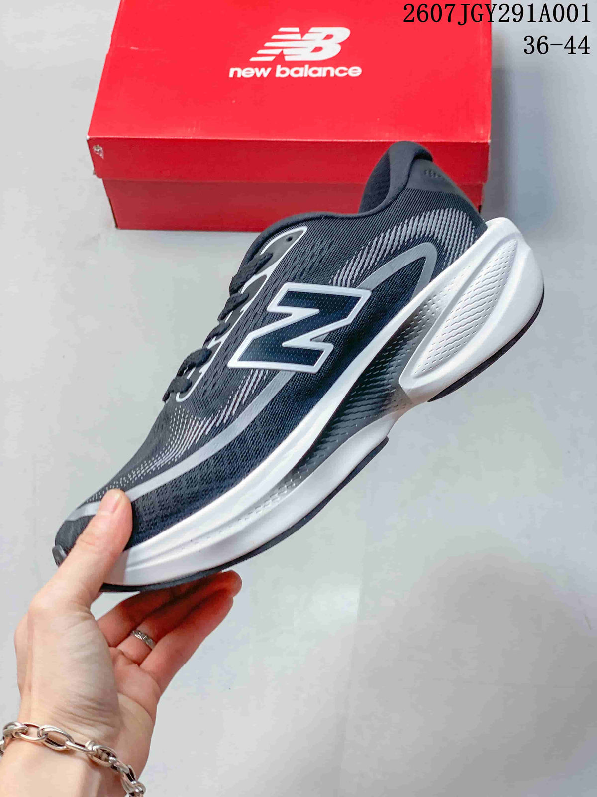 Side view of the dark navy running shoe with gray accents, a large side logo, and a white sculpted midsole.