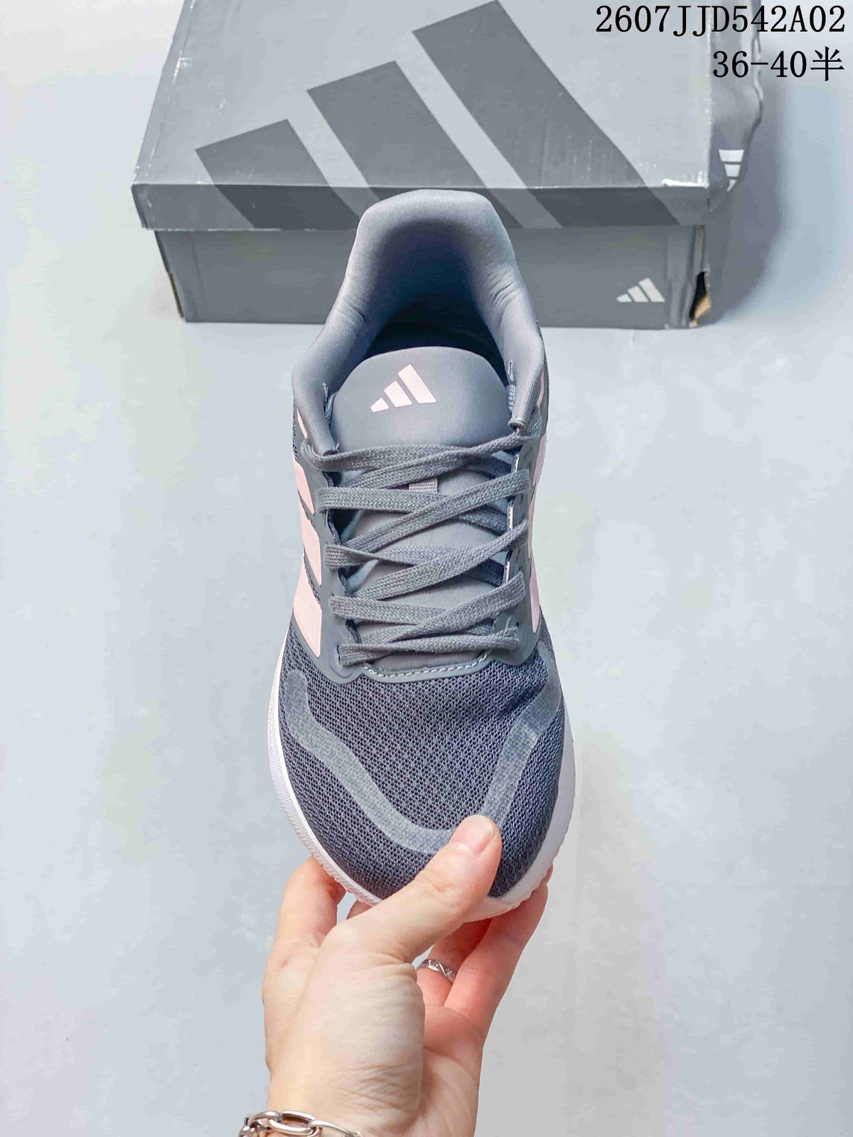 Front view showing the laces and mesh-like upper.