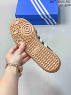 Close-up of the patterned gum-colored outsole