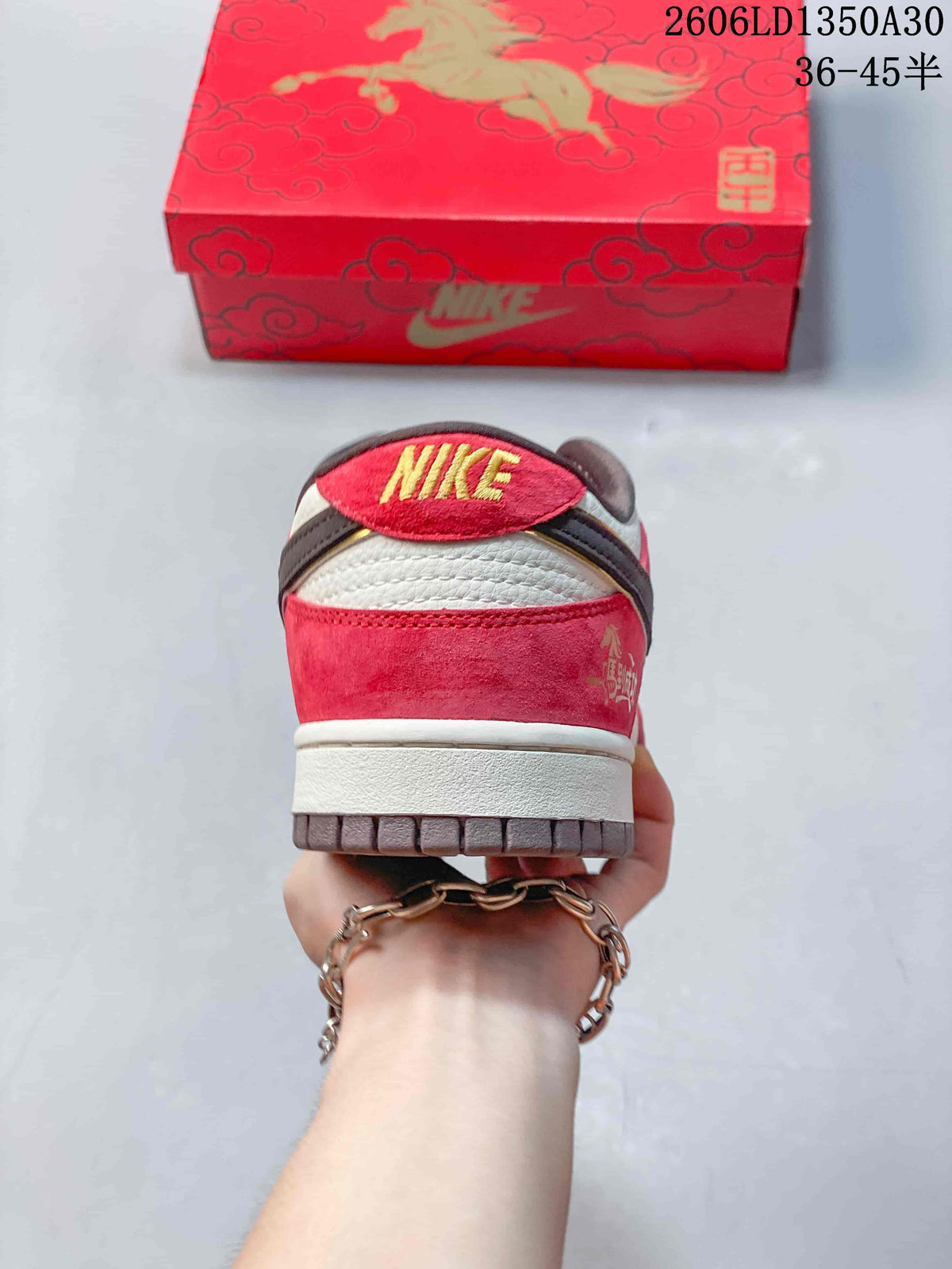 Rear view of the red and cream low-top sneaker with Nike heel branding