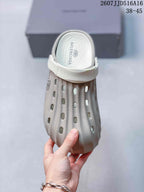 Top view of the clog showing the perforated upper and footbed branding.