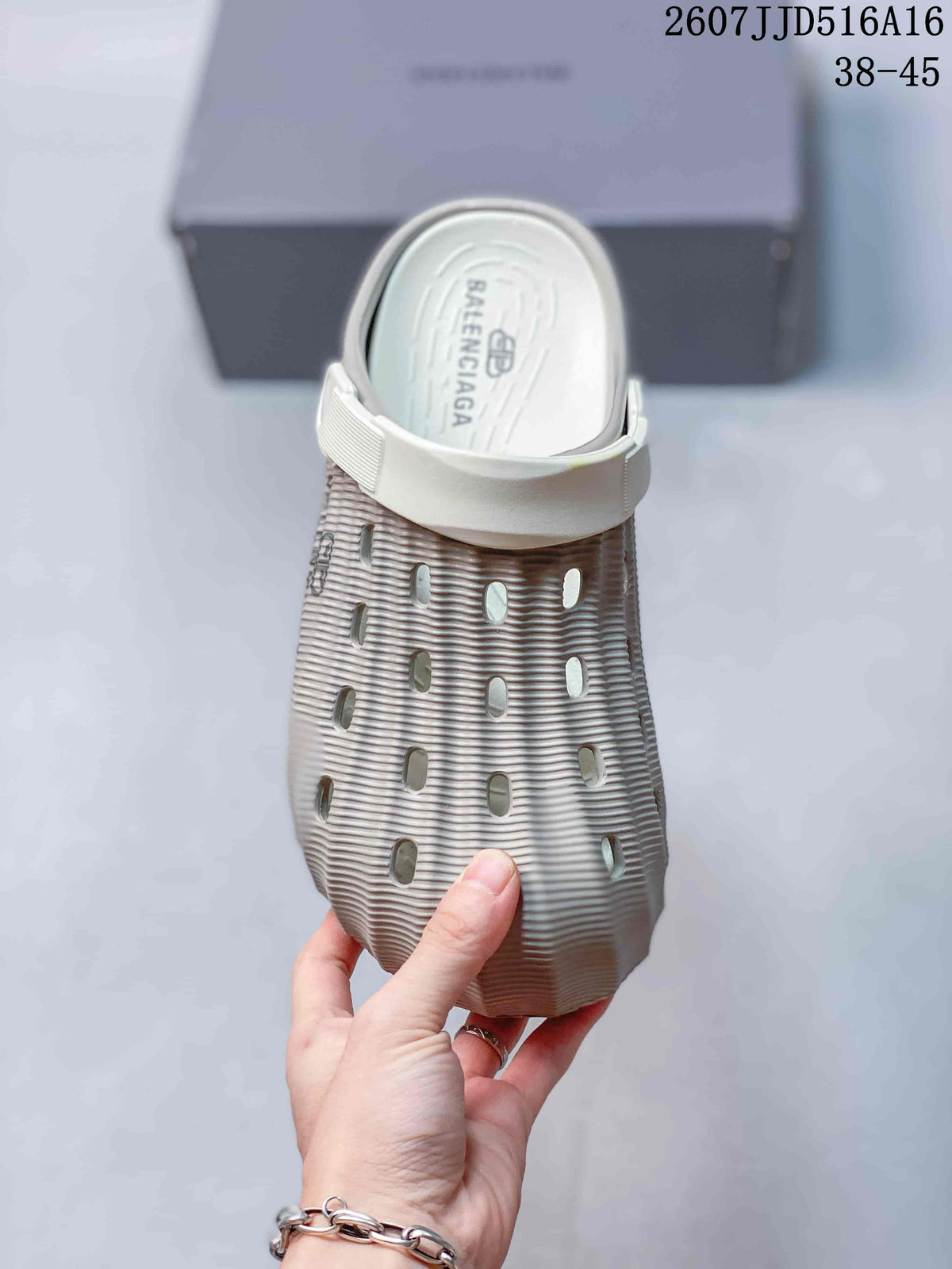 Top view of the clog showing the perforated upper and footbed branding.