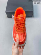 Front view showing the laces and perforated toe
