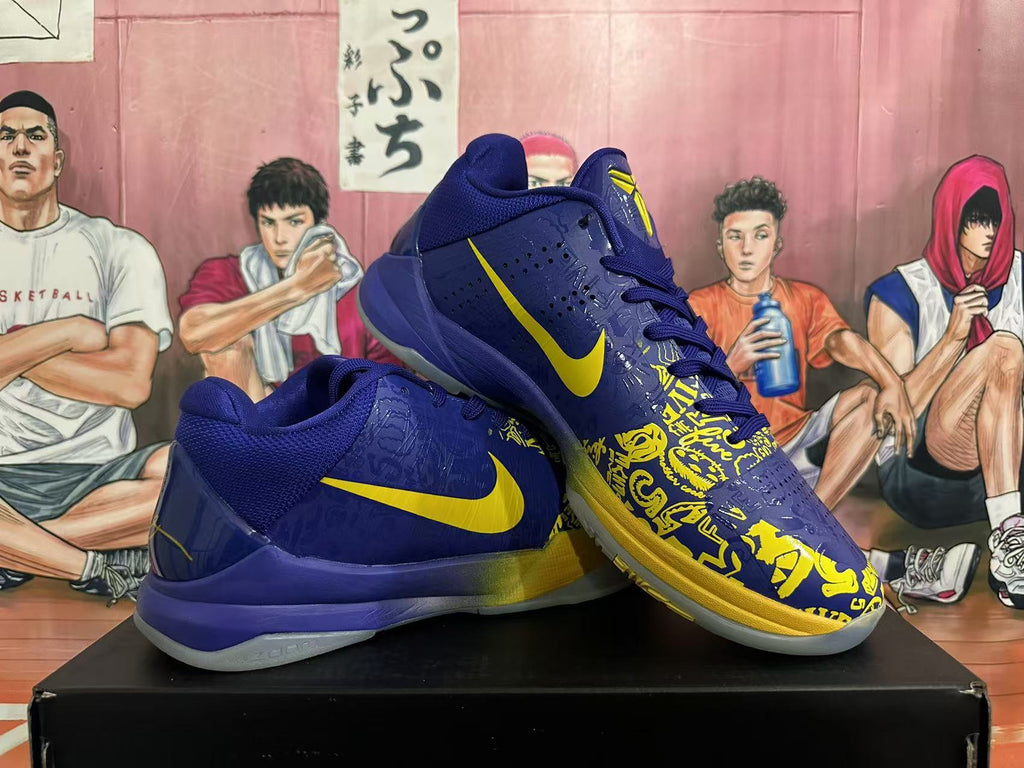Angled view of blue and yellow Nike basketball sneakers showing side Swooshes, graphic forefoot panels, and translucent outsoles.