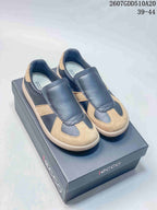 Pair of navy and tan ECCO sneakers displayed on a branded box; image text shows style code 2607GDD510A20 and sizes 39–44.