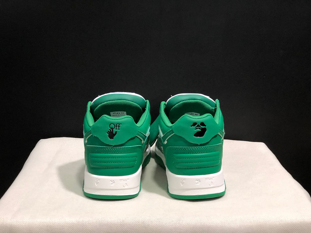 Rear view of the pair showing green heel panels, graphic heel details and white midsoles.