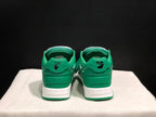 Rear view of the pair showing green heel panels, graphic heel details and white midsoles.