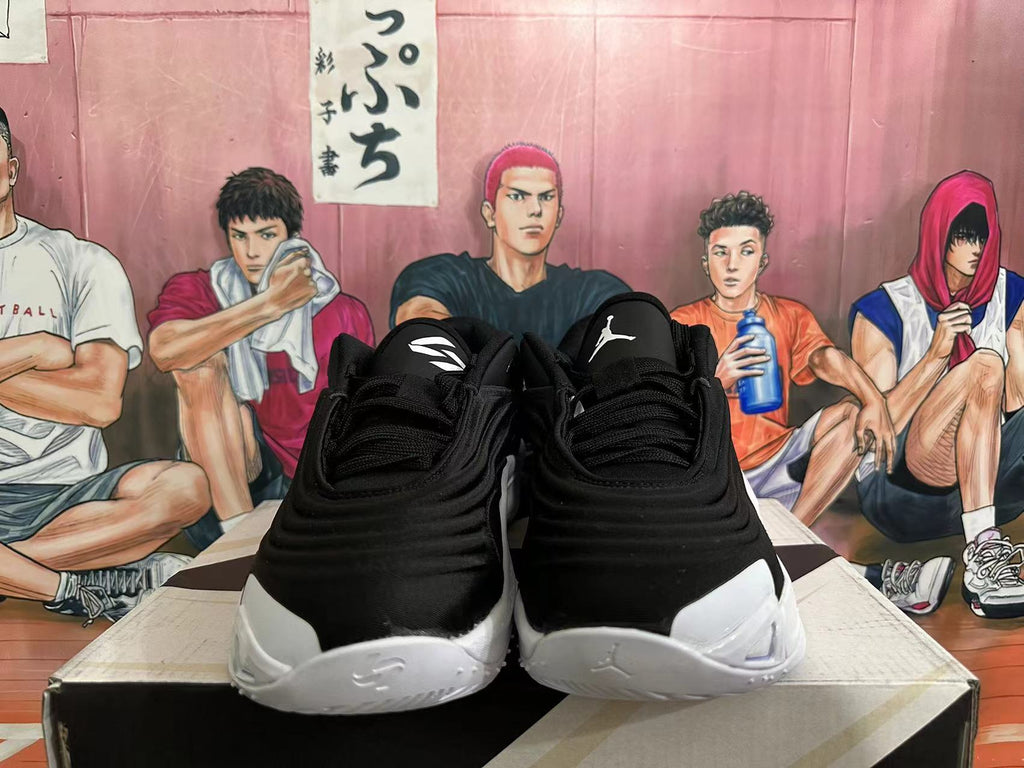 Front view of black and white basketball shoes