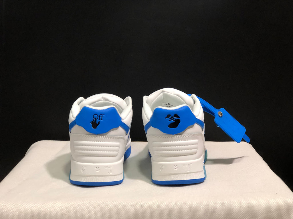 Rear view showing blue heel panels, padded collars, and printed heel details.