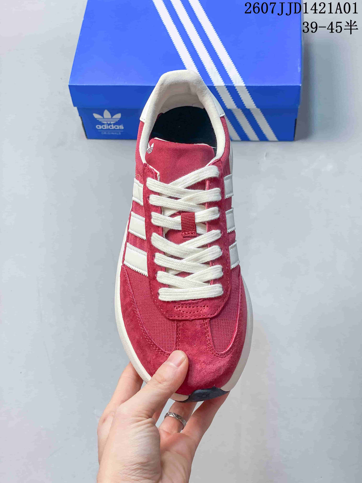 Front view of the red Adidas Adizero SL 72 Pro sneaker, showing white laces, side stripes, and padded collar.