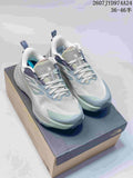 Pair of gray and pale green The North Face Altamesa 500 sneakers displayed on a shoebox; overlay shows style code 2607JYD974A24 and size range 36–46.5.