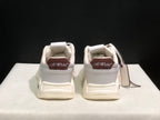 Rear view of the sneaker pair showing brown heel panels with OFF-WHITE branding.
