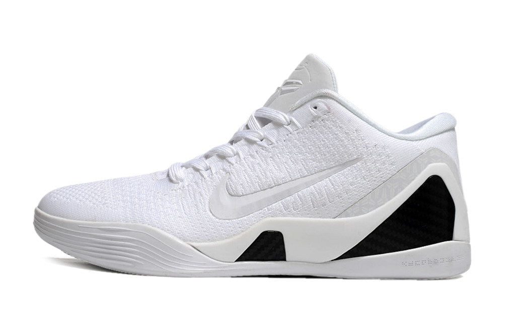 Side view of an all-white low-top basketball shoe.