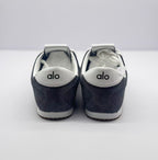 Rear view of the pair with Alo branding on the white heel accents.