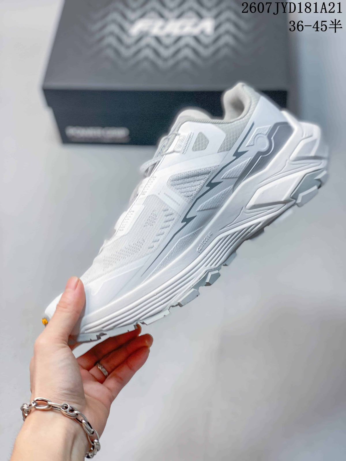 Side profile of the white KAILAS shoe showing the layered upper, graphic details, and lugged sole.
