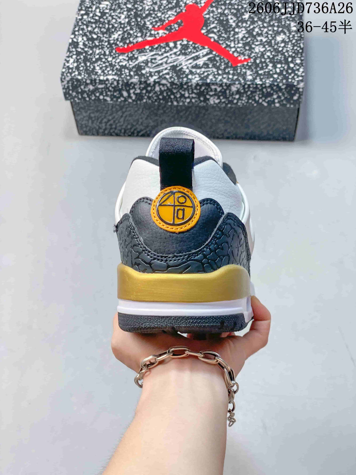 Rear view showing the textured heel overlay, gold heel band, and pull tabs.