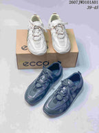 White and charcoal sneaker color options shown together; overlay shows style code 2607JWD101A01 and size range 39–45.