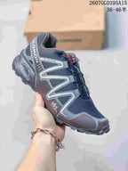 Angled side view of a Salomon Speedcross 3 shoe with visible Gore-Tex, Contagrip, and M&S Contagrip markings on the upper and sole.