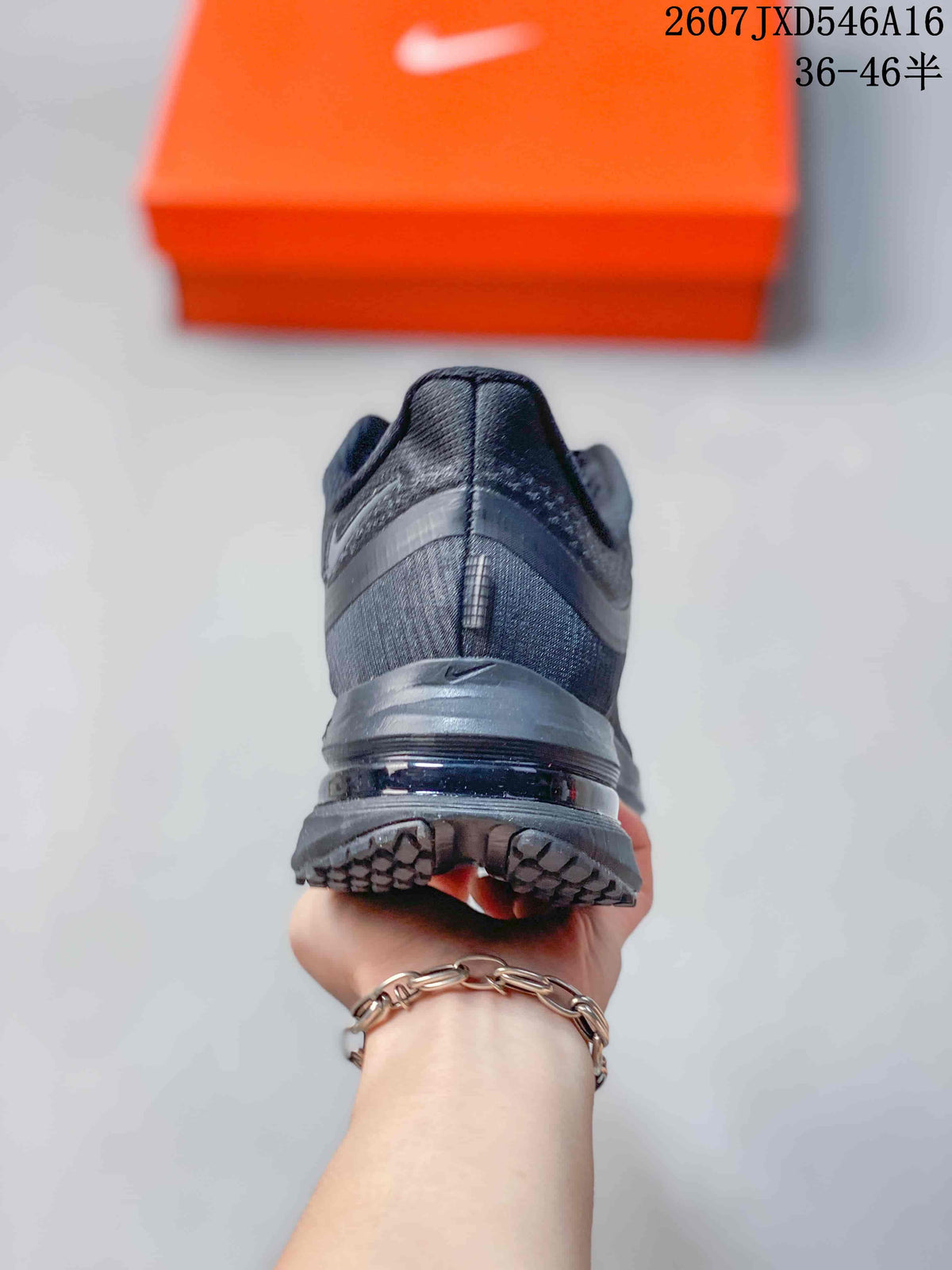 Rear view showing the padded heel, layered midsole, and textured outsole.