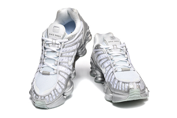 Nike Shox TL Sneakers in White and Metallic Silver
