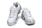 Nike Shox TL Sneakers in White and Metallic Silver