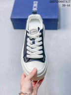 Top view of one sneaker showing the lace-up front, white toe cap, and tongue label.