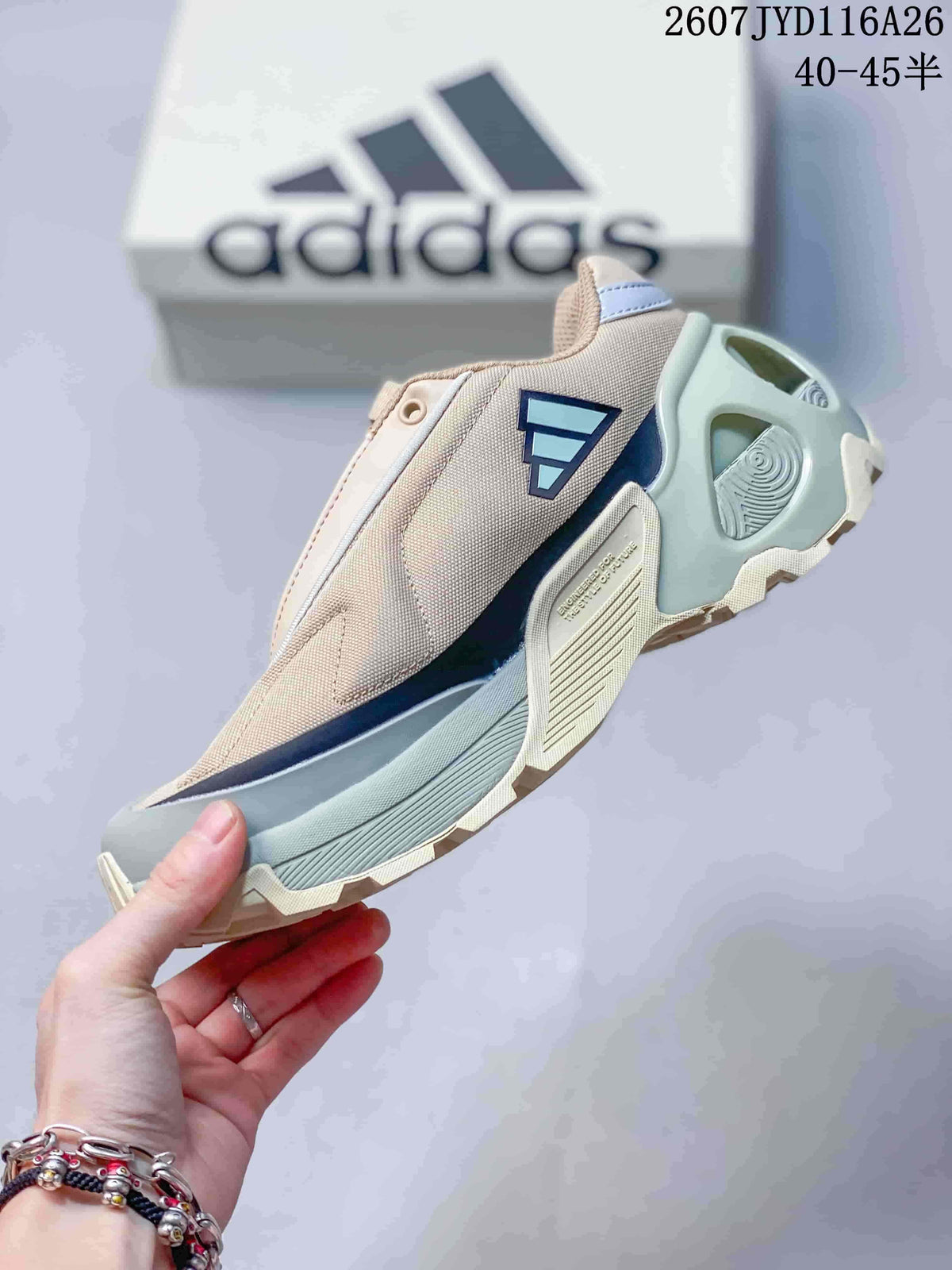 Side view highlighting the beige upper, adidas side branding, layered midsole and mint heel structure.