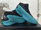 Pair of navy-blue and black basketball shoes shown from the side