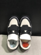Top-down view showing the laces, adjustable midfoot straps, padded collars, and branded insoles.