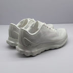 Rear three-quarter view showing the padded heel collars, heel branding, and outsole edge.