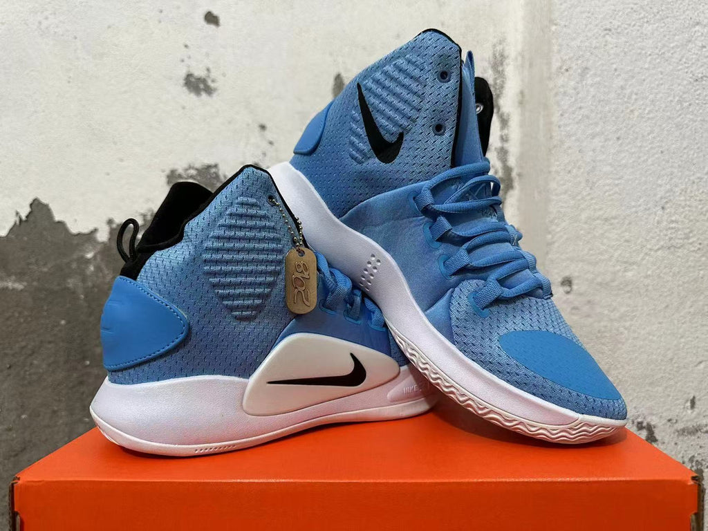 Pair of blue high-top basketball shoes shown from the side and at an angle.