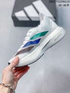 Side view highlighting the white upper, multicolor panels and sculpted midsole.