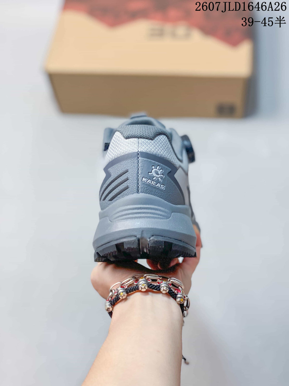 Rear view of the gray hiking shoe showing the padded heel collar, Kailas branding, and rugged outsole.