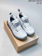 Pair of white and gray ON Cloudtilt Remix sneakers displayed on a shoe box, with code 2607JGD1546A16 and size range 36–45 visible at the top.