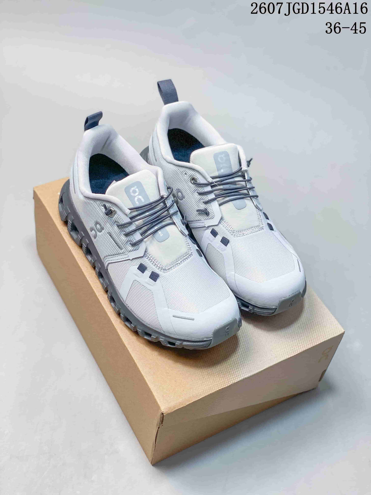 Pair of white and gray ON Cloudtilt Remix sneakers displayed on a shoe box, with code 2607JGD1546A16 and size range 36–45 visible at the top.