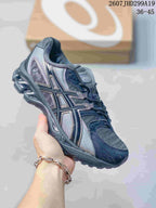 Dark gray and silver ASICS Gel-Nimbus 10.1 sneaker with layered side panels and a sculpted outsole; image text shows style code 2607JHD299A19 and size range 36-45.