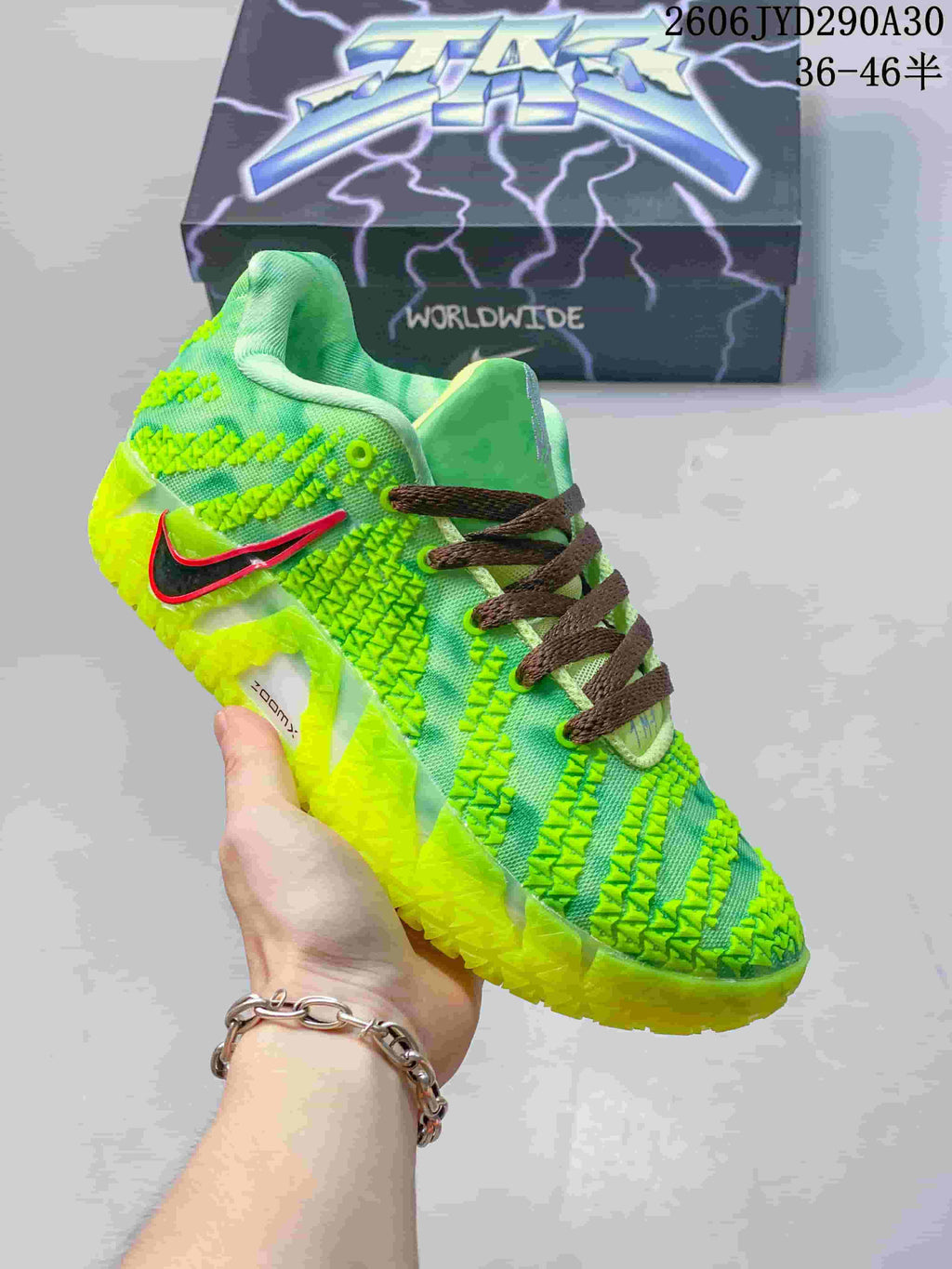Neon green Nike Ja 3 basketball shoe with dark laces and a translucent-looking outsole