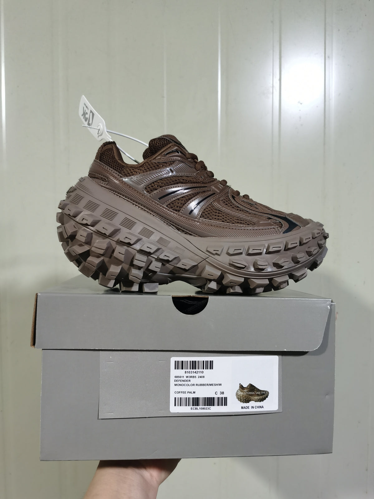 Coffee-brown sneaker displayed on its box; the visible box label includes style 2408, color Coffee Palm, and sample size C 38.
