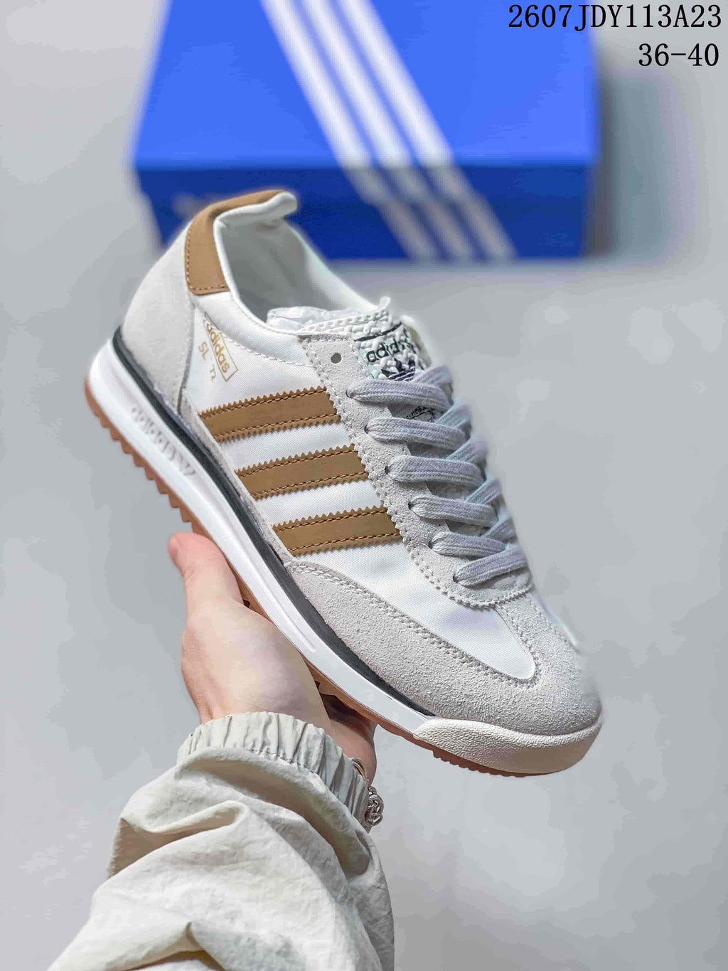White and tan adidas SL 72 sneaker with gray overlays, gray laces and a gum-look outsole.