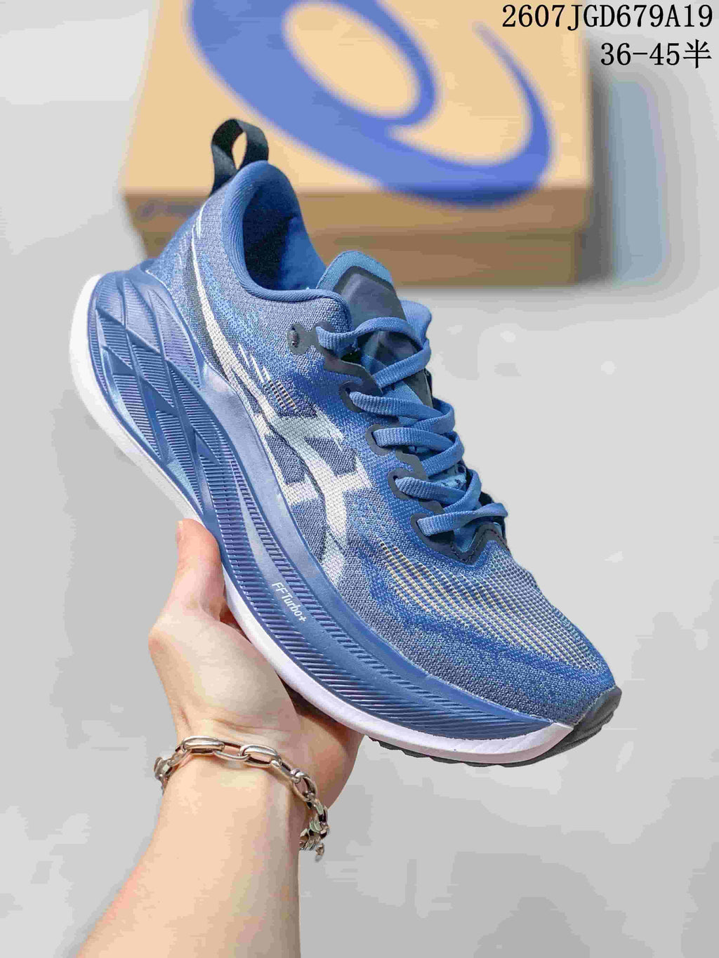 Blue ASICS SUPERBLAST 2 running shoe with white side detailing and a matching blue outsole, shown from a front three-quarter angle.